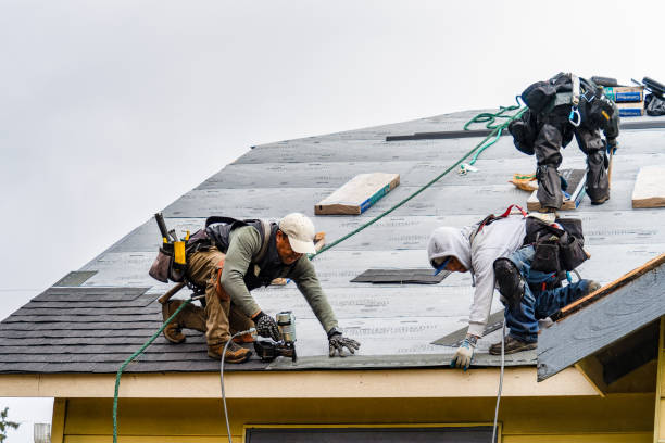 Professional Roofing technician working in West Hills, NY